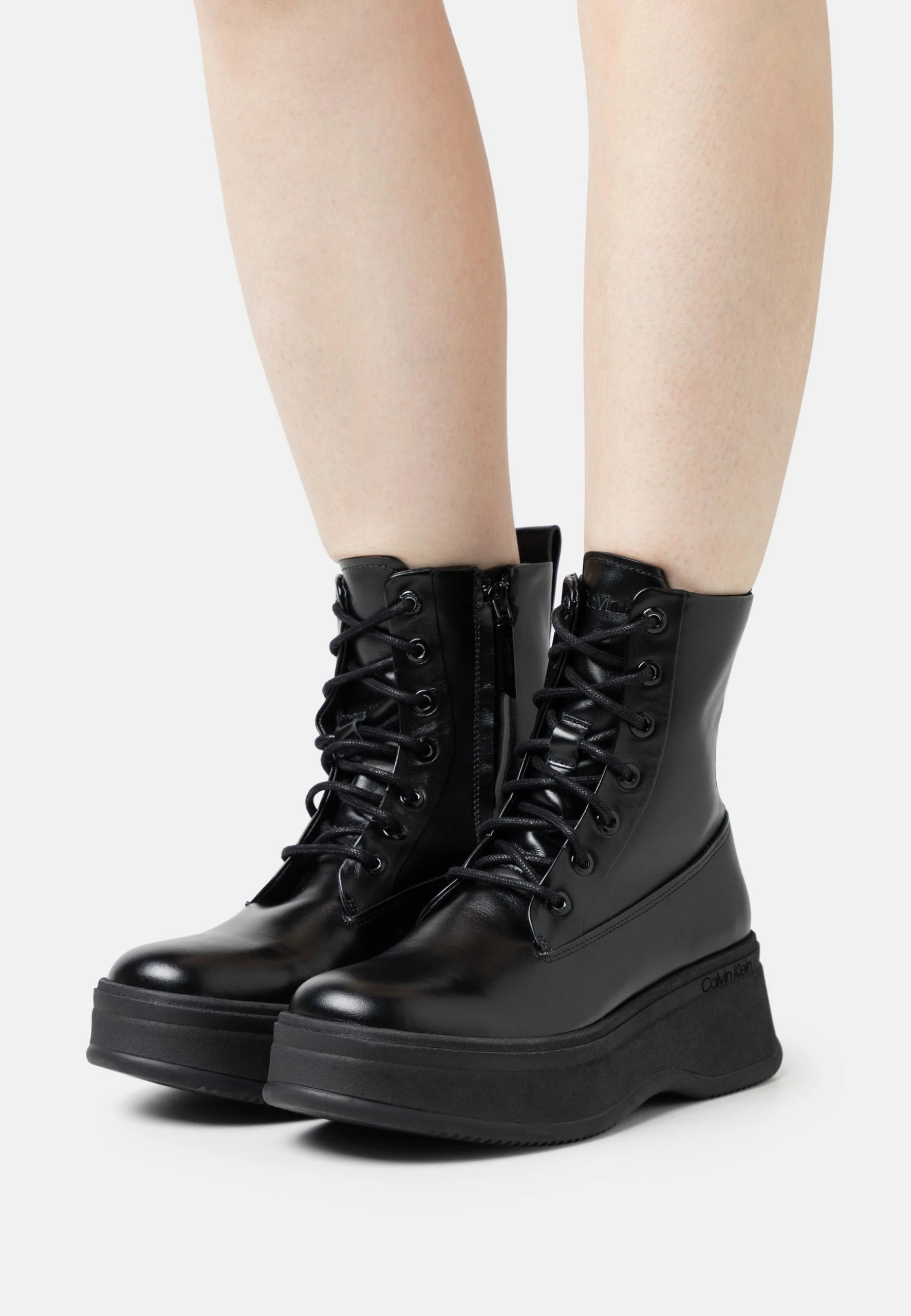 Calvin Klein Pitched Combat- Lace-Up Ankle Boots - Black 1 Calvin Klein Pitched Combat- Lace-Up Ankle Boots - Black