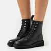 MICHAEL Michael Kors Haskell Bootie - Lace-Up Ankle Boots - Black