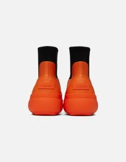 AMBUSH Orange Rubber Chelsea Boots