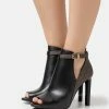 MICHAEL Michael Kors Lawson Open Toe - High Heeled Ankle Boots - Black/Brown