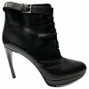 Alexander McQueen Curved Heel Platform Ankle Boots In Black Leather