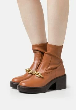 Coach Kenna Bootie - Platform Ankle Boots - Burnished Amber