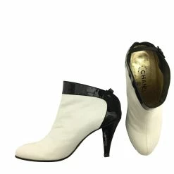 Chanel Ankle Boots In White Leather With Black Patent Trim