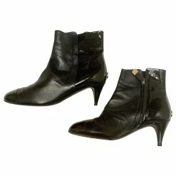 Chanel CC Black Leather And Patent Ankle Boots