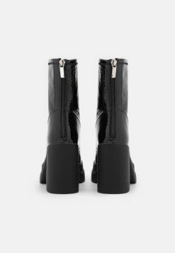 FREE PEOPLE Double Stack Platform - High Heeled Ankle Boots - Black -winter shoes Sales 2023 f5bbdbea533a4aebaac2be66baf57d87